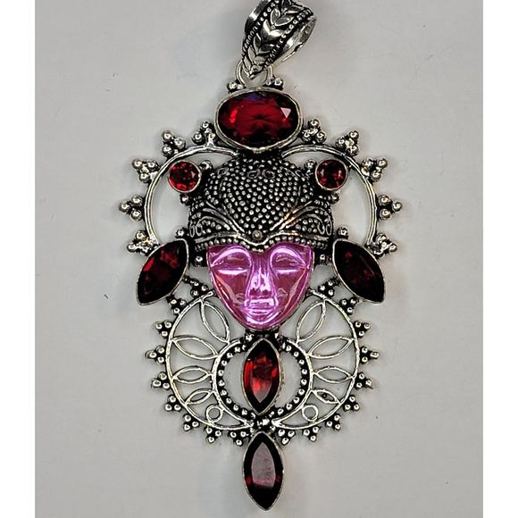 Sterling Silver Pendant with Pink Carved Face and Garnet Accents - Picture 1 of 10